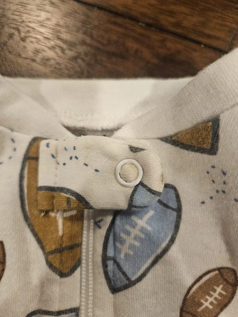 TWIN BOYS Footed One-Piece Pajama in White with Football Print - 3/6 Months